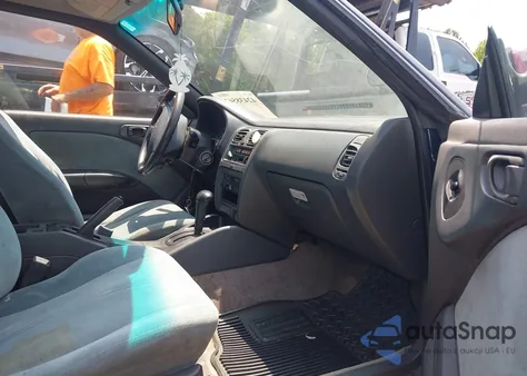 1996 Subaru Legacy L from USA, damaged, VIN 4S3BD4356T7203384